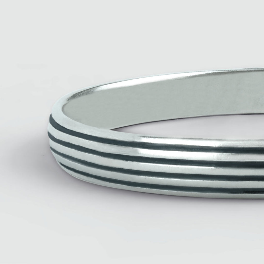 A personalised Arkan - sterling silver bangle bracelet 8mm with black and white stripes.