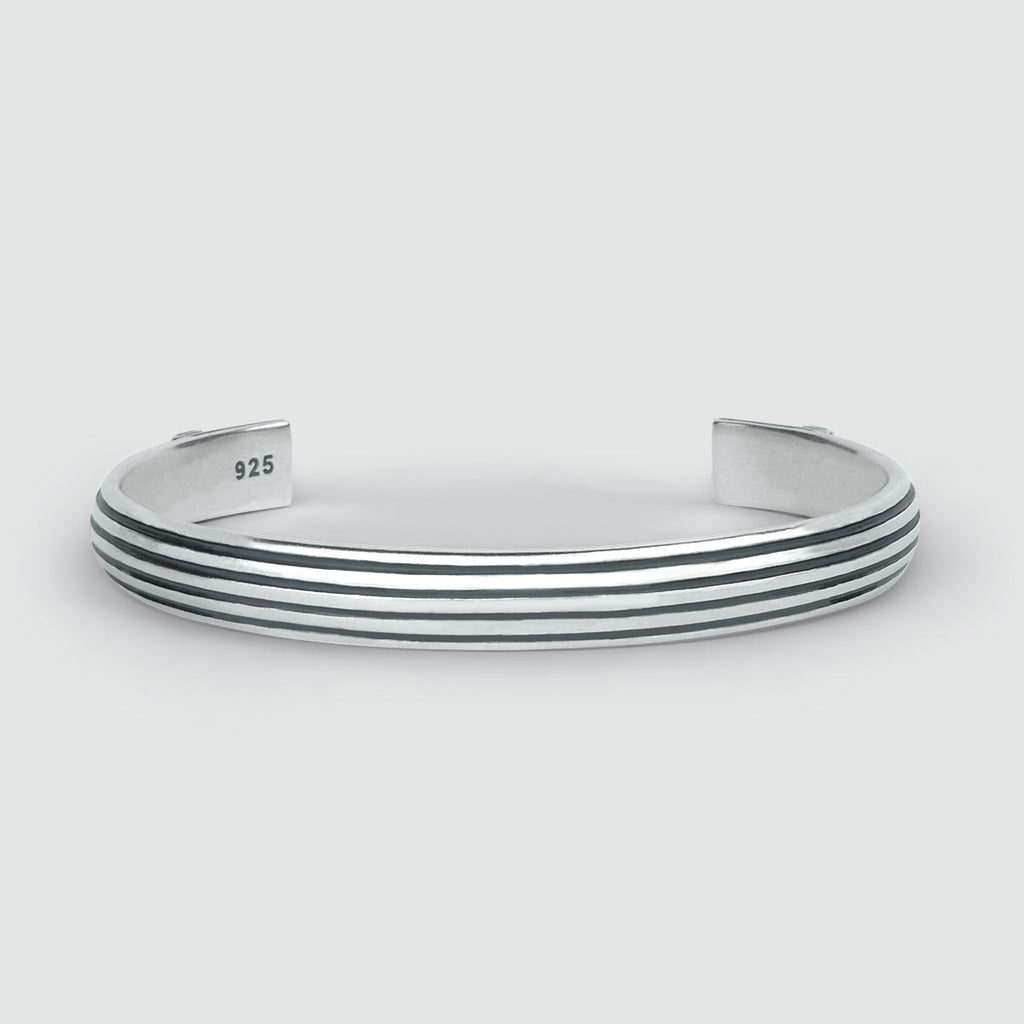 An Arkan - Sterling Silver Bangle Bracelet 8mm with a striped design, perfect for men.