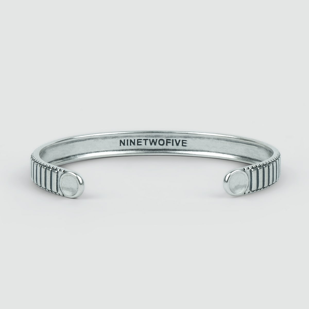 A personalised Kenan - Sterling Silver Bangle Bracelet 7mm with the word ninewolfe on it.