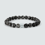 A Aswad - Black Beaded Bracelet 8mm with a silver clasp.