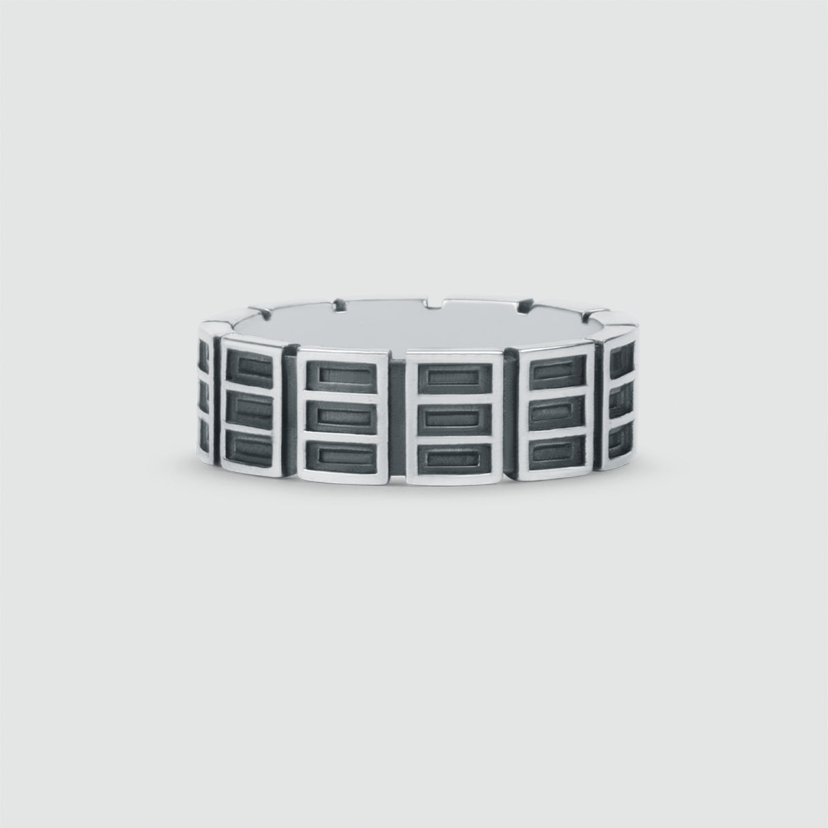 Ayman - Oxidized Sterling Silver Ring 7mm with black squares on it.
