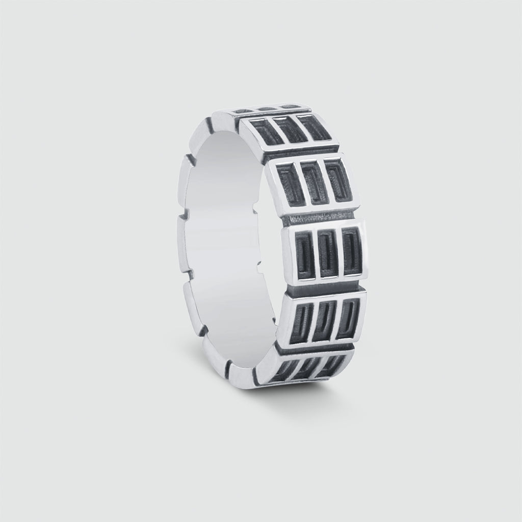 An engraved Ayman - Oxidized Sterling Silver Ring 7mm with black and white squares.