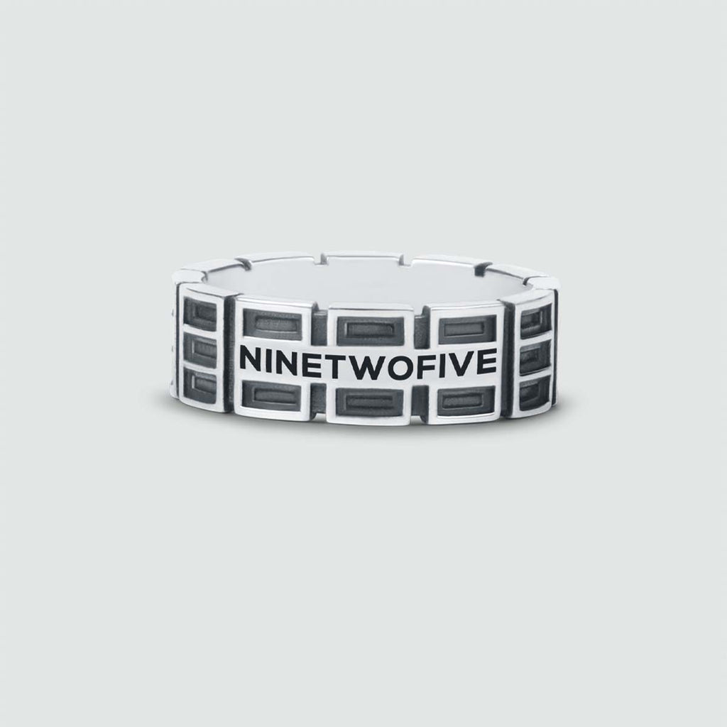 An Ayman - Oxidized Sterling Silver Ring 7mm with the word ninetwive on it.