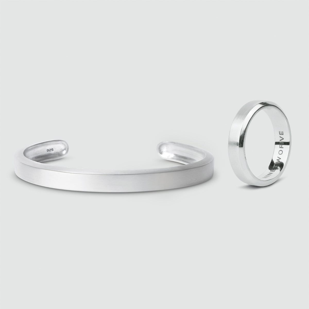 A pair of Boulos and Tamir - set cuffs and a Boulos and Tamir - set ring, handmade from 925 silver.
