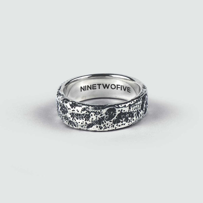 Front view of the Tarif sterling silver mens ring, showcasing the Ninetwofive logo engraved inside.