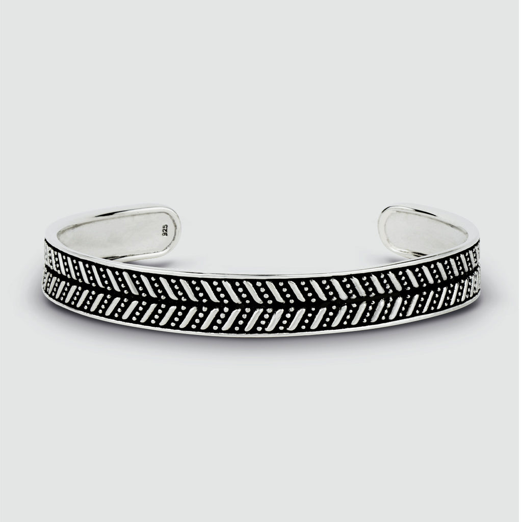 A Danyal - Oxidized Sterling Silver Bangle Bracelet 9mm with engraved black and white designs.