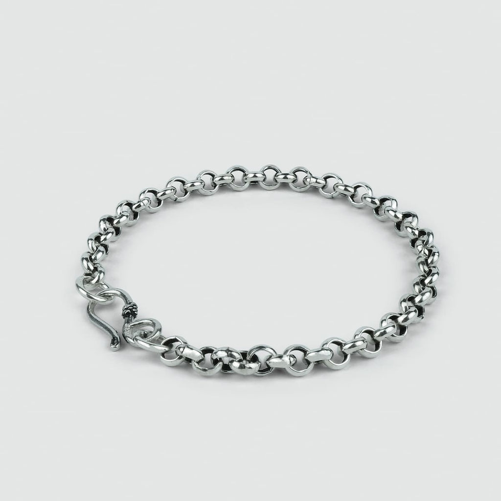 A personalized Ishak - Sterling Silver Chain Link Bracelet 6mm with a clasp.