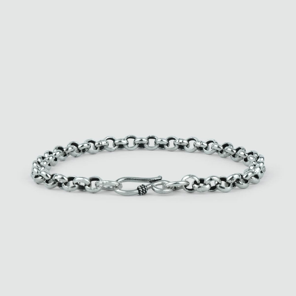 A Ishak sterling silver chain link bracelet 6mm on a white background.