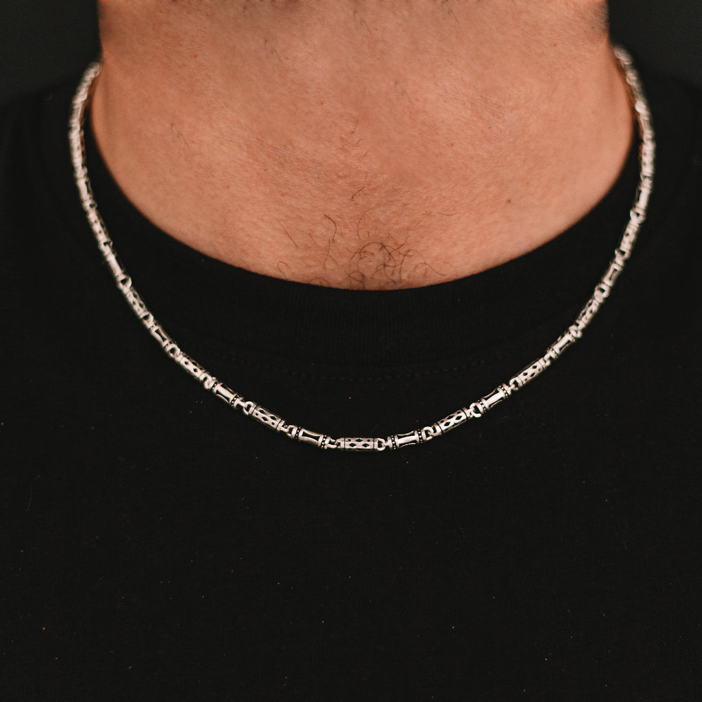 A Kadeem - Sterling Silver Ornaments Chain Necklace 3.5mm, available in lengths of 50cm and 60cm, featuring a silver chain.
