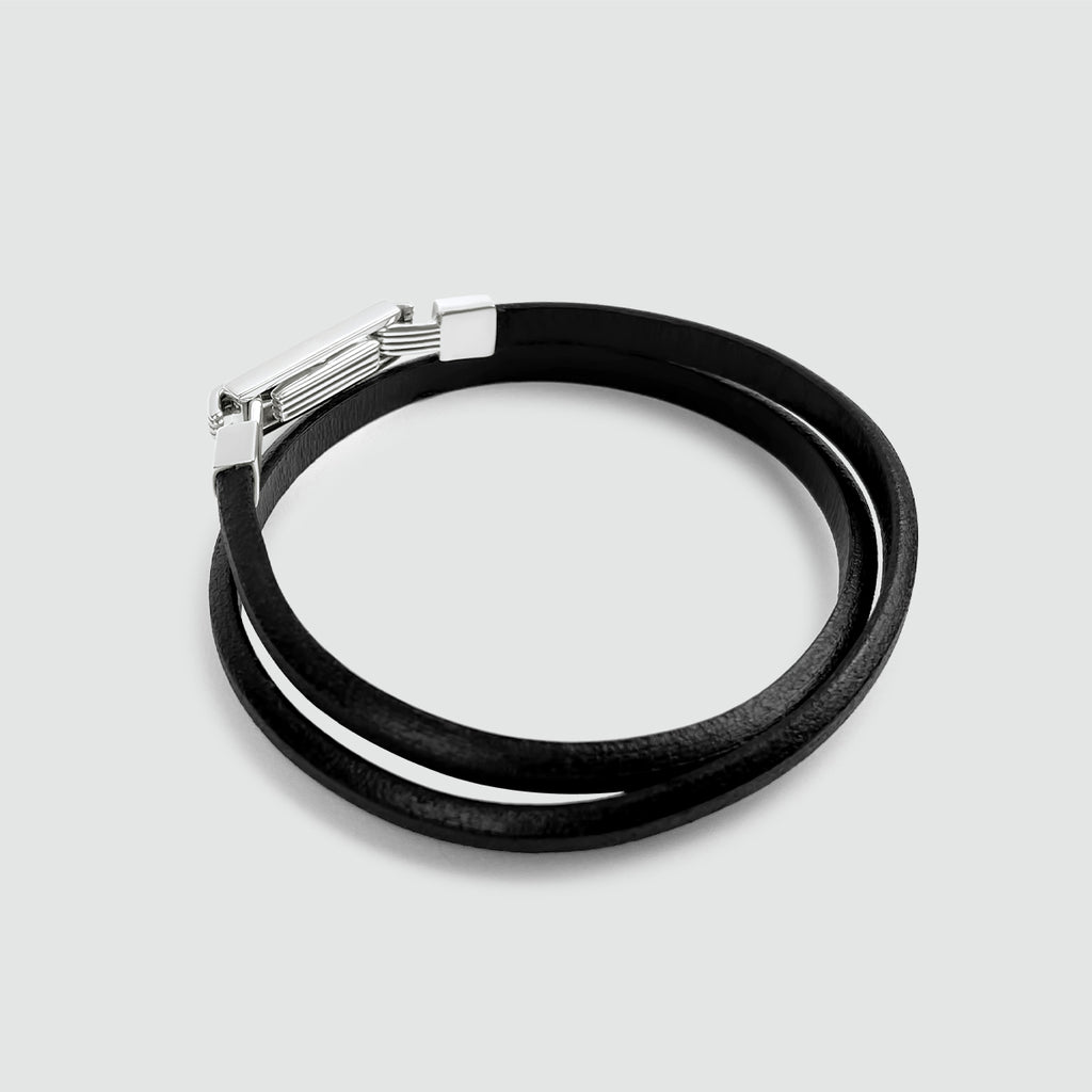 A Rami Genuine Black Leather Bracelet 5mm with a silver clasp, perfect for men.