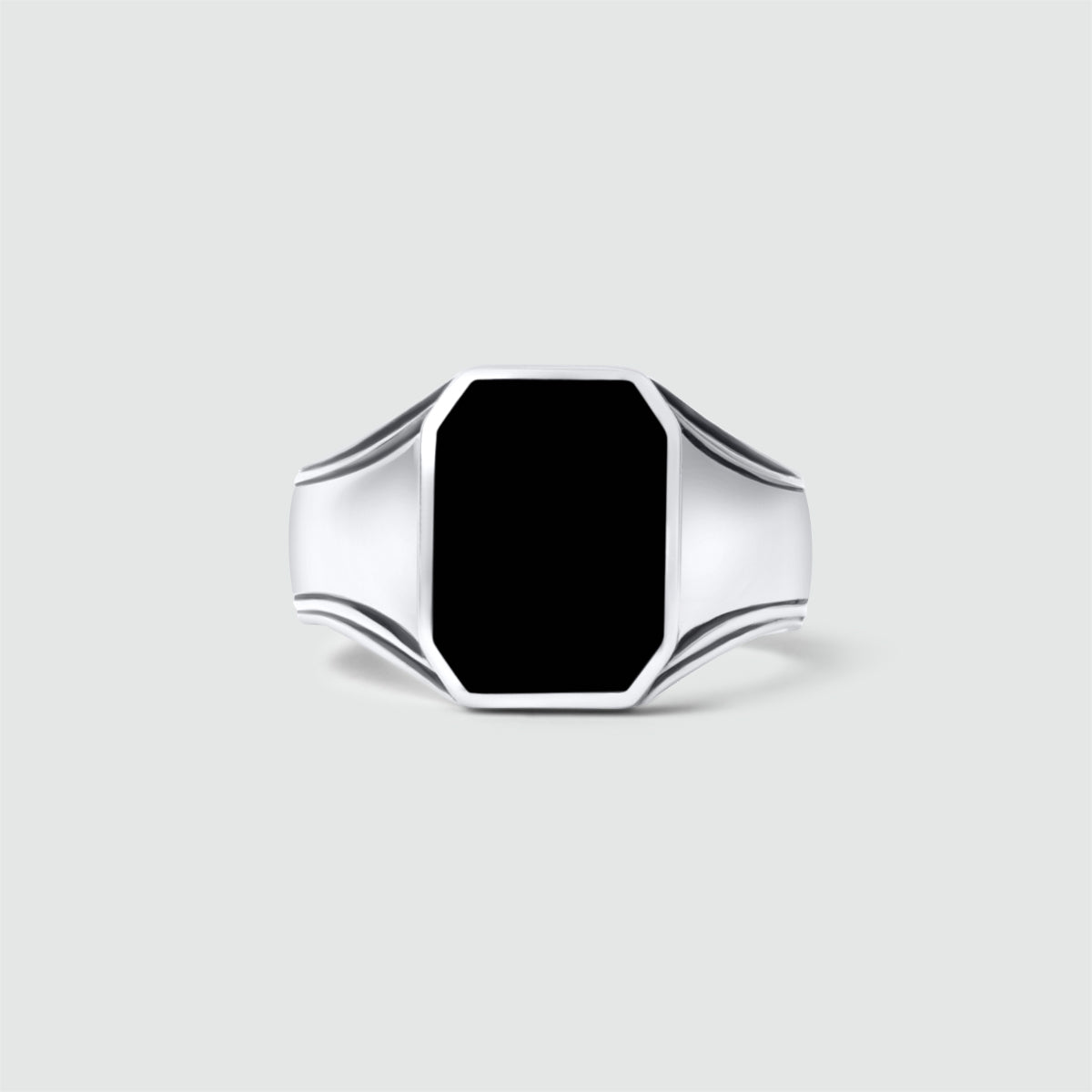 A NineTwoFive Baki - Black Onyx Signet Ring 17mm on a contrasting background.