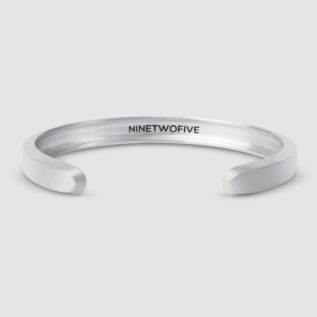 A Boulos - Plain Sterling Silver Bangle Bracelet 8mm with the word ninetyfive engraved on it.