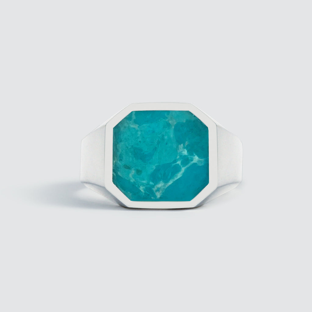An Nuri - Sterling Silver Blue Turquoise Signet Ring 13mm on a white background.