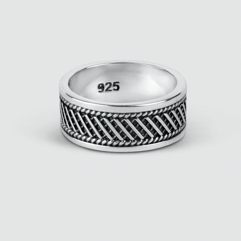 Engraved detail of Kaliq oxidised sterling silver mens ring for personalised jewellery by Ninetwofive.